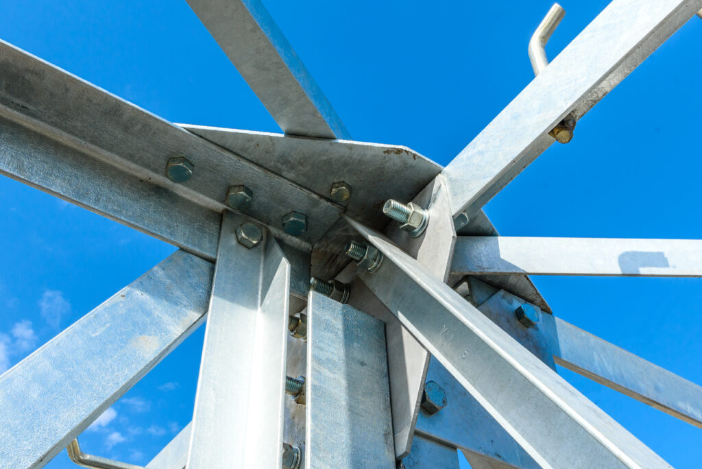 Angle bars formed joined by plates, bolts and nuts